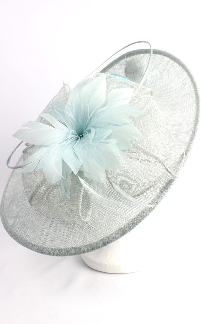 Larger round sinamay hatinator  w floral feature and circular  ice blue feather spheres STYLE: HS/3005 /BLU image 0